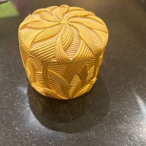 Slatkin & Co gold Palm Beach candle holder with candle